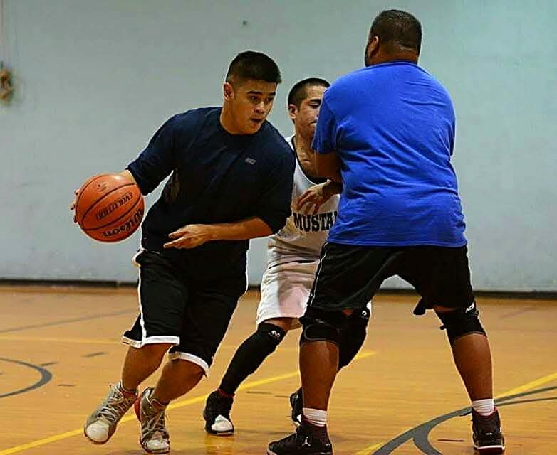 Ian Aragon evades Mitchell Serranilla via a screen from Lorenz "G" Guerrero circa 2013